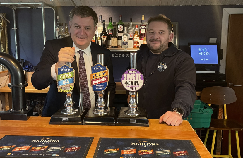 Picture caption: Mel Stride, MP for Central Devon and Secretary of State for Work and Pensions with Dan Taylor from Hanlon’s Brewery