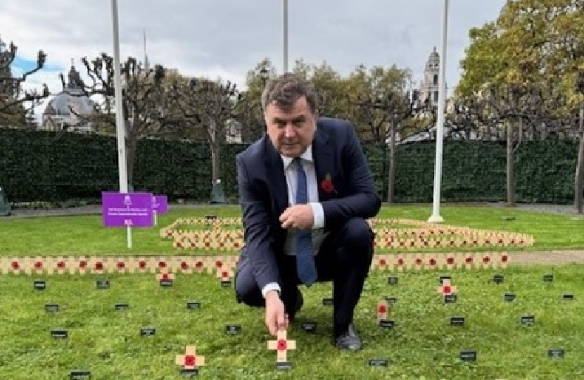 Mel Stride, MP for Central Devon, placing his constituency’s cross in the Constituency Garden of Remembrance