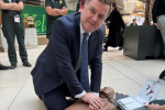 Mel Stride in Parliament receiving CPR training from the London Ambulance Service