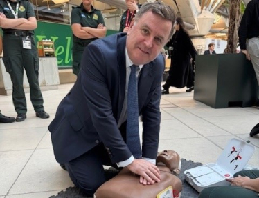 Mel Stride in Parliament receiving CPR training from the London Ambulance Service